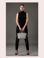 CrossKulture - BlissStyle grey lightweight handbag carried by female model