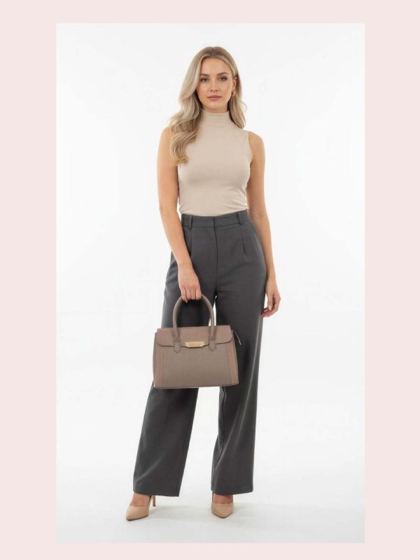 CrossKulture - BlissVibe grey lightweight handbag carried by female model