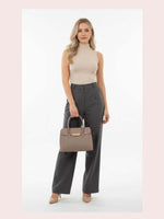 CrossKulture - BlissVibe grey lightweight handbag carried by female model