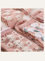 CrossKulture - SoleHugs pink crew socks detailing view