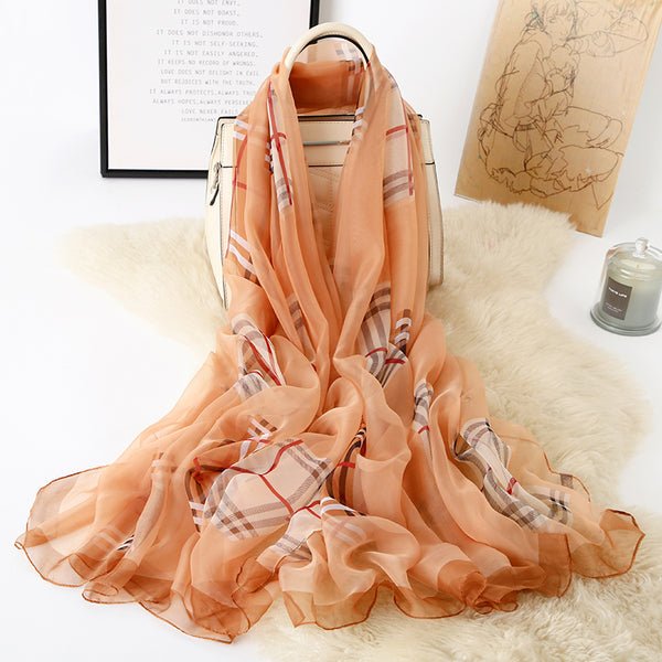 CrossKulture - WhisperFlow Long Chiffon Scarf Brown placed on a bag view