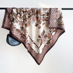 CrossKulture - WineBlossom satin scarf hanging on a handle bar