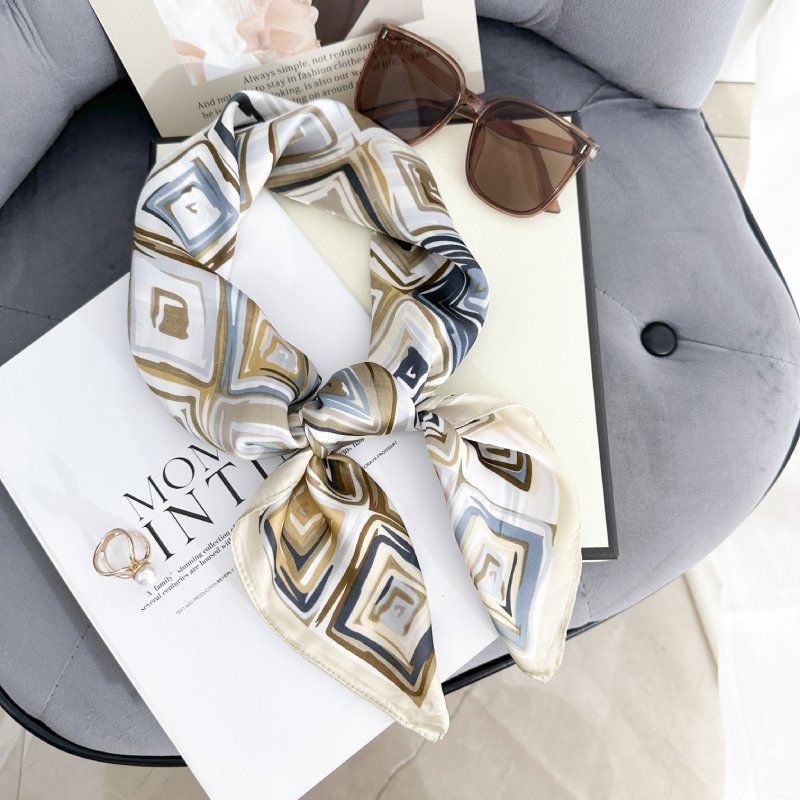 CrossKulture - GeoScape short satin scarf front knot view placed on a table