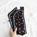 CrossKulture - NightStory Satin Neck Scarf Black full view in model hands