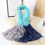 CrossKulture - CloudKiss Long Chiffon Scarf Blue placed on a bag view