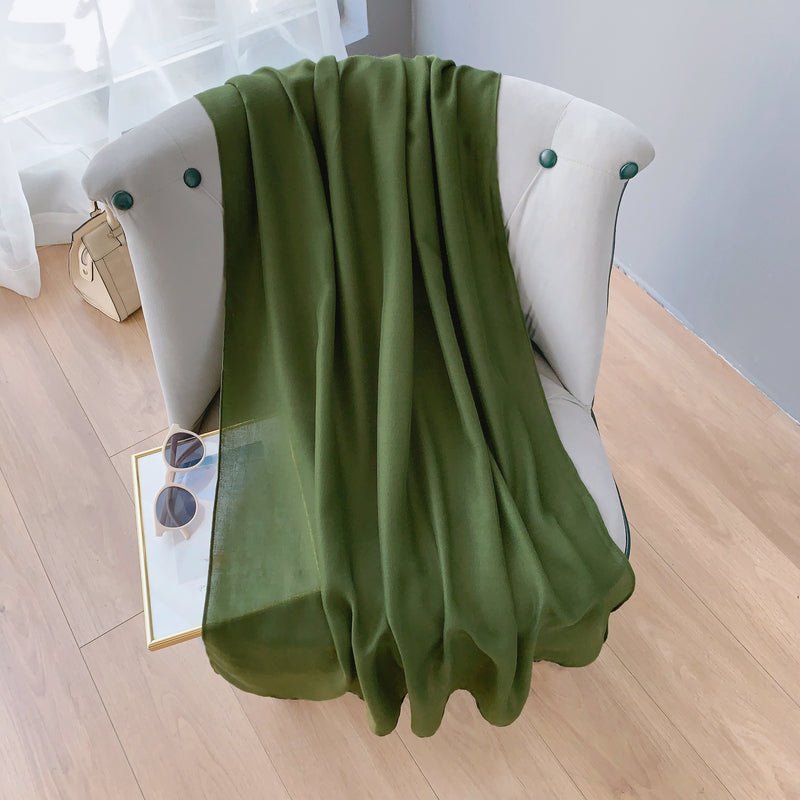 CrossKulture - OliveFlow Viscose Cotton Scarf Green placed on chair view