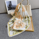 CrossKulture - SunshineFlow Small Square Satin Scarf Green placed on bag view