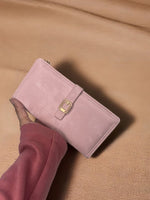 CrossKulture -SilkCarry lightweight long wallet front view in model hand