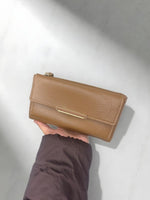 CrossKulture -PerfectCarry lightweight long wallet front view in model hand