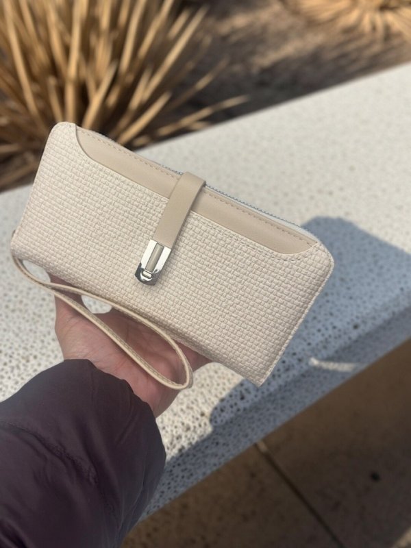 CrossKulture -ExquisiteCarry lightweight long wallet front view in model hand
