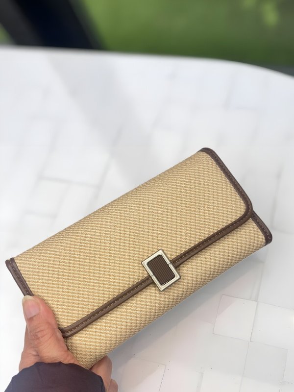 CrossKulture -NobleCarry lightweight long wallet front view in model hand
