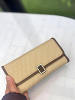 CrossKulture -NobleCarry lightweight long wallet front view in model hand