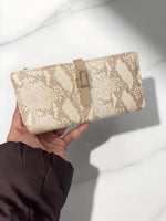 CrossKulture -PlushCarry lightweight long wallet front view in model hand
