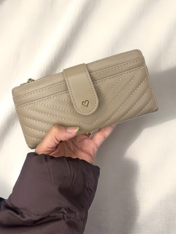 CrossKulture - SleekCarry lightweight long wallet front view in model hands