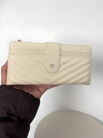 CrossKulture - ChicCarry lightweight long wallet front view in model hand