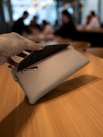 CrossKulture - CitySling lightweight sling bag with model hand view