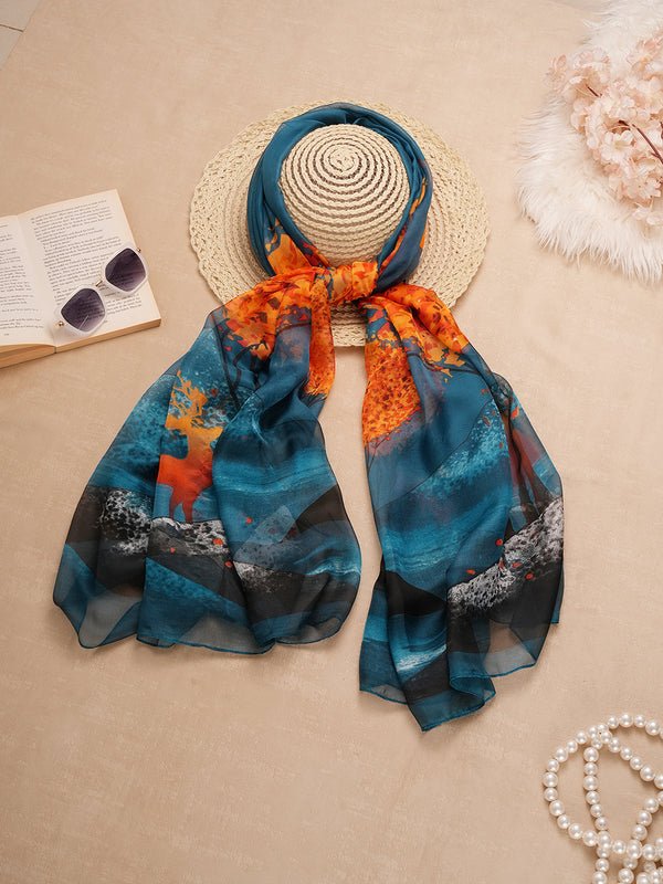 CrossKulture - OceanWhisper Long Chiffon Scarf Teal Orange on a hat view