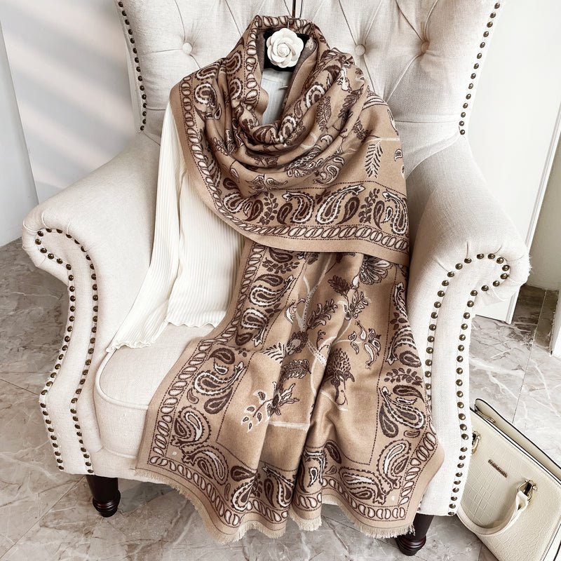 CrossKulture - SteamyBrew Paiseley pattern wool Scarf placed on a sofa