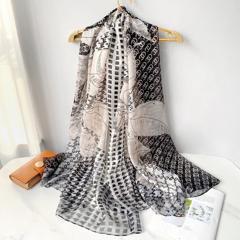 CrossKulture - MistyWhiff Long Chiffon Scarf Black hanging on hanger view