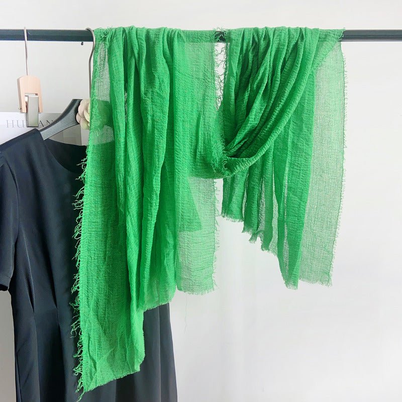 CrossKulture - GreenLeaf Green Crinkled Cotton Scarf hanging on a handle view