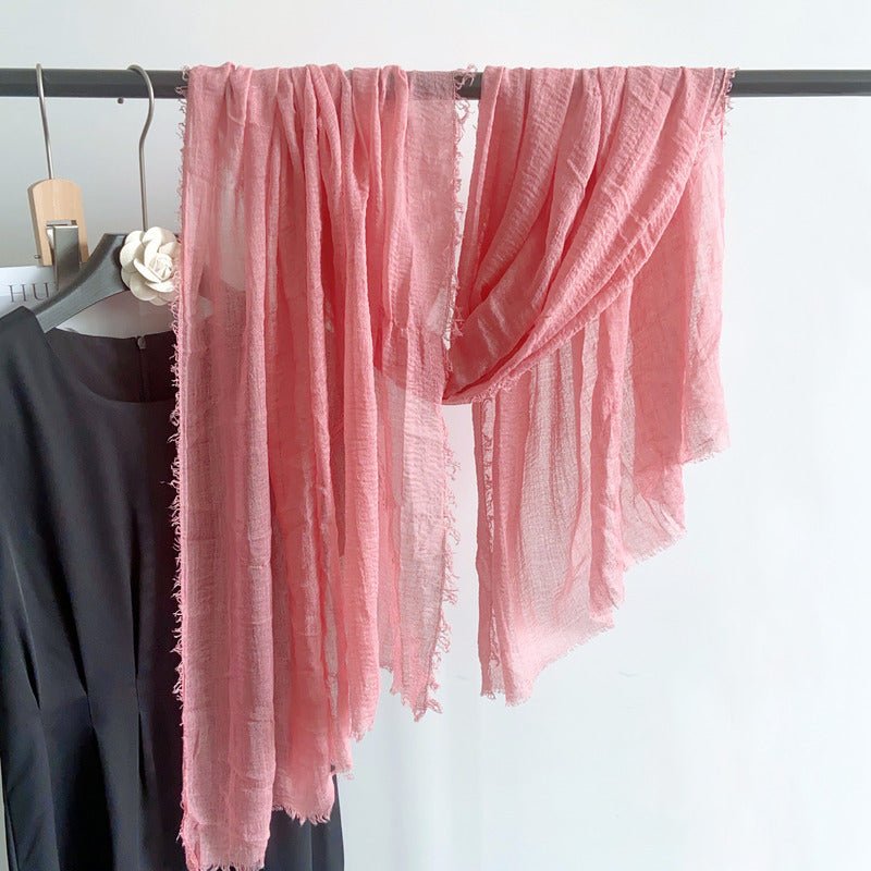 CrossKulture - PinkSlip Rose Pink Crinkled Cotton Scarf hanging on a handle view