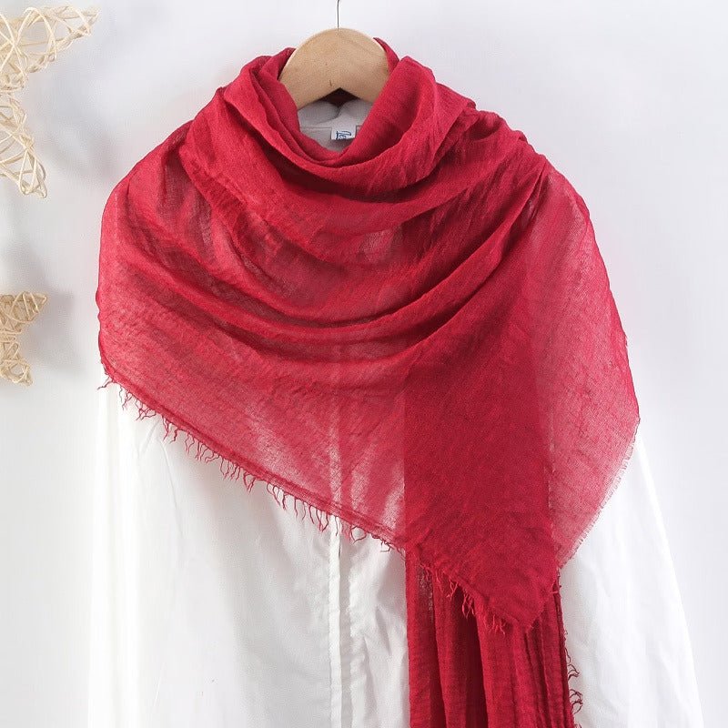CrossKulture - RedFlag Red Crinkled Cotton Scarf styled on a hanger view