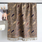 CrossKulture - PaisleyWeave lightweight modal scarf hanging on a handle bar