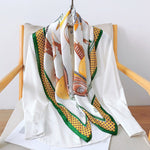 CrossKulture - PearlyPine Large Square Satin Scarf Green styled on hanger view