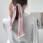 CrossKulture - ChampagneScript Satin Neck Scarf Pink tied on hair view