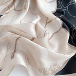 CrossKulture - CarbonGlow Small Square Satin Scarf Black fabric detailing view