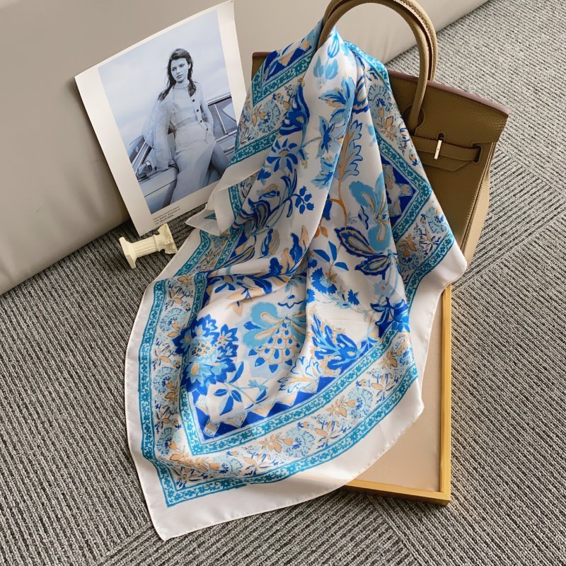 CrossKulture - AquaSpring Small Square Satin Scarf Blue tied placed on a bag view