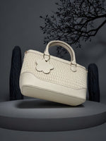 CrossKulture - BlissMagic lightweight white handbag front side view placed on a table