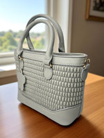 CrossKulture - BlissStyle lightweight grey handbag side view placed on a table
