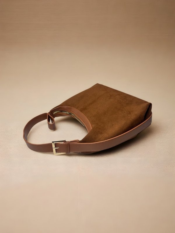 CrossKulture - BlissLuxe lightweight brown handbag placed on a table