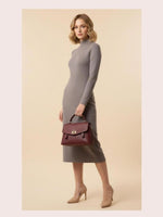 CrossKulture - BlissLite wine lightweight handbag carried by female model