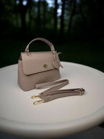CrossKulture - BlissEase lightweight peach handbag side view showing long strap