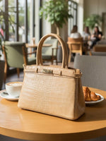 CrossKulture - BlissGlow lightweight beige handbag side view