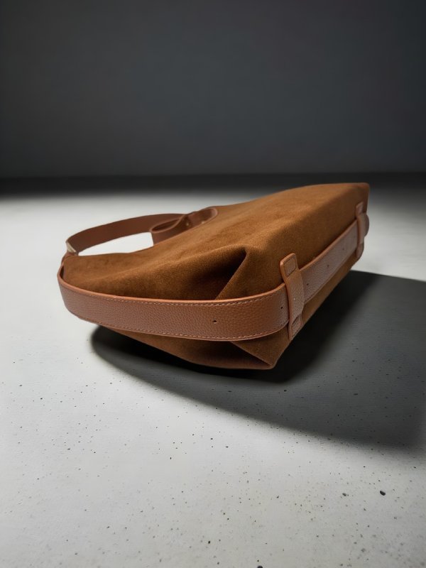 CrossKulture - BlissLuxe lightweight brown handbag placed on a table