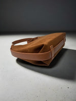 CrossKulture - BlissLuxe lightweight brown handbag placed on a table