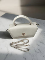 CrossKulture - BlissPearl lightweight white handbag side view showing long strap