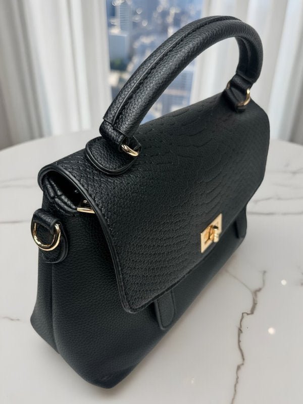 CrossKulture - BlissPulse black handbag with textured design, side view