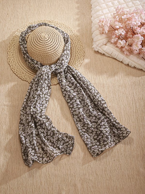 CrossKulture - AcaciaBloom Floral Print Poly Cotton Scarf Grey placed a on a hat view