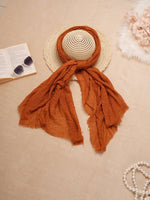 CrossKulture - SandyDusk Tan Crinkled Cotton Scarf style on a hat view