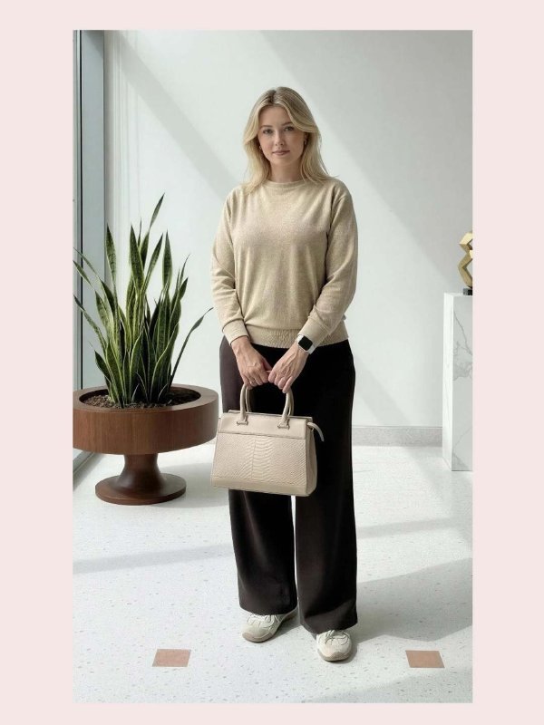 CrossKulture - BlissWear beige lightweight handbag carried by female model