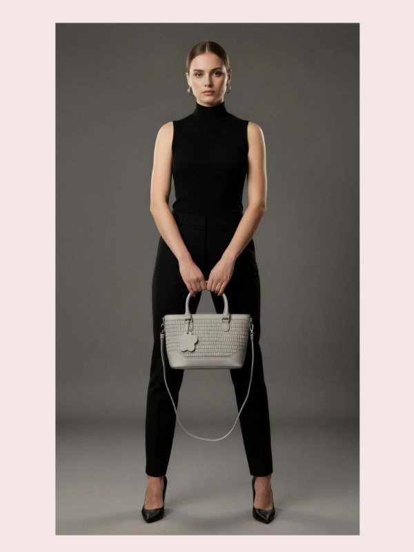 CrossKulture - BlissStyle grey lightweight handbag carried by female model