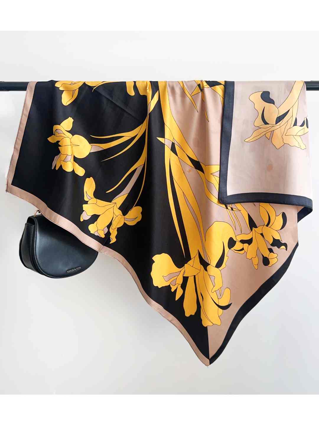 CrossKulture - SunnyFlora satin scarf hanging on a handle bar