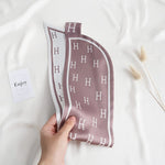 CrossKulture - MauveCalm satin neck scarf in model hands