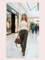 CrossKulture - BlissCharm two front pocket brown handbag carried by female model