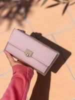 CrossKulture -PrettyCarry lightweight long wallet front view in model hand