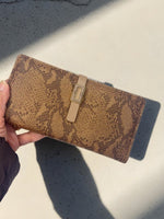 CrossKulture -OpulentCarry lightweight long wallet front view in model hand